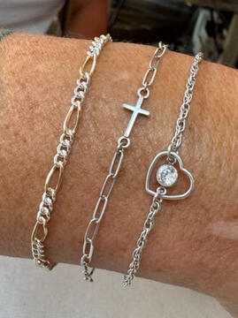 bracelet stack with cross and heart