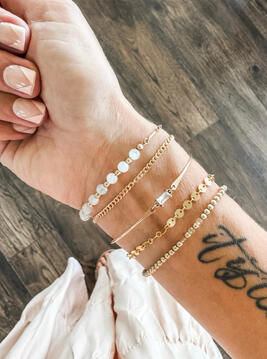 gold bracelet stack with soleil beads, bangle and stretch